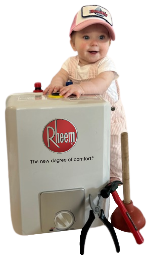 a baby standing next to a water heater